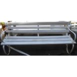 A 1.83m old painted cast iron framed garden bench with triple slatted back and seat