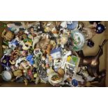 A large collection of miniature animal and other figurines and ornaments including a Limogue grand