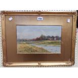 George Oyston: a gilt and wide slipped framed watercolour, depicting sheep grazing beside a river