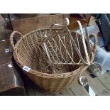 A wicker log basket with flanking handles - sold with a vintage painted metal magazine rack