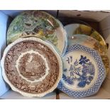 A box containing assorted china including blue and white meat plates, collectors' plates, etc.