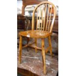 A vintage hoop stick back kitchen chair with moulded solid elm seat