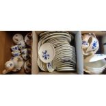 Three boxes containing a Gien part dinner service including plates, tureens, coffee set, etc.