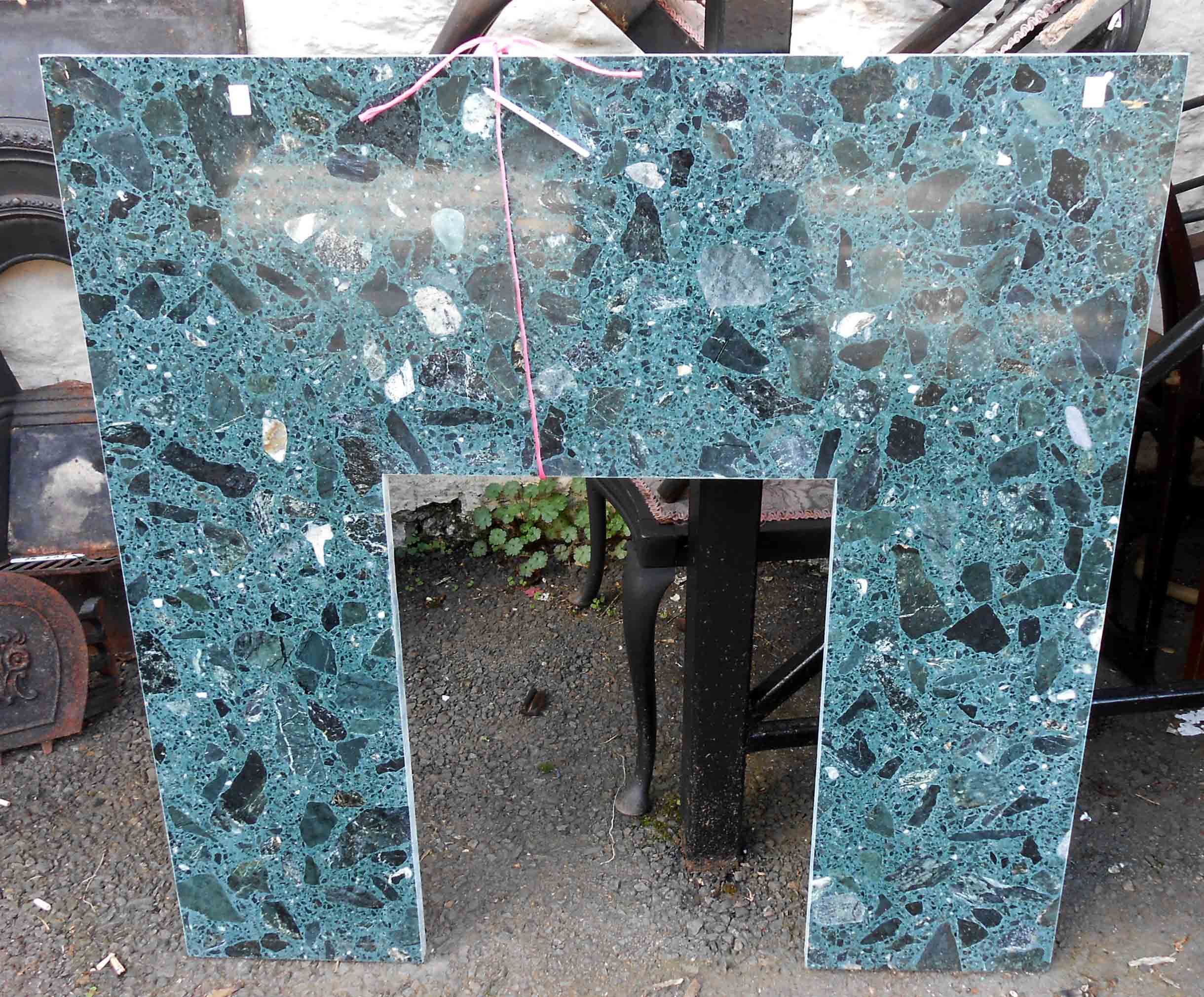 A 94cm wide Italian green marble fireplace insert