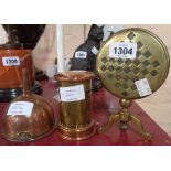 A miniature brass folding chess table, copper funnel, and a copper and brass postbox money box