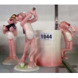 Two Royal Orleans ceramic Pink Panther figurines (one a/f) - sold with a similar mug