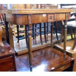 A 93cm 19th Century mahogany and mixed wood fold-over tea table, set on turned legs - old repairs,