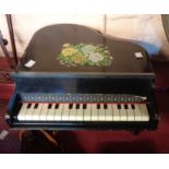 A vintage Chinese toy grand piano