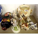 Four 20th Century cow creamers, a Bargeware hot water bottle and a decorative vase