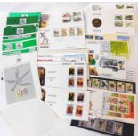 A collection of FDCs, some mint decimal stamp packs, and stamp bulletins including Malawi covers,
