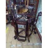 A large 1920's Chinese rosewood framed hexagonal hanging lantern with pierced decoration and