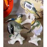 A Karl Ens porcelain figurine depicting two bluetits on a branch (a/f) - sold with two further