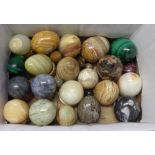 A collection of twenty six stone eggs including malachite, etc. - various size