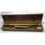 A mahogany cased single draw brass telescope with fitted tripod