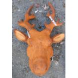 A cast iron stag's head