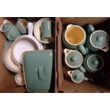 Two boxes containing assorted vintage Denby stoneware items including jugs, hot water jugs,