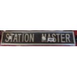 A modern reproduction cast metal Station Master sign