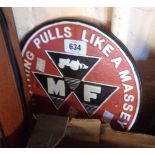 A modern reproduction painted cast metal Massey Ferguson sign