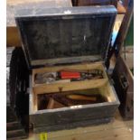 A painted pine tool chest containing a small quantity of tools