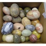 Twenty eight hardstone eggs of various size