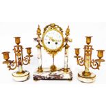 A 19th Century French ormolu and pink marble clock garniture, comprising a decorative drum dial