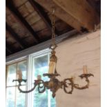 A 20th Century brass five branch chandelier with candle effect sconces