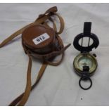 A vintage compass by Watts of London in leather case with strap