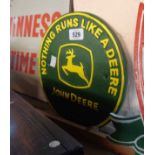A reproduction painted cast metal John Deere sign