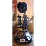 A vintage Betacom push button candlestick telephone