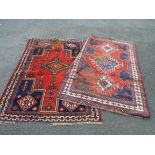 Two Middle Eastern wool rugs - both in poor condition
