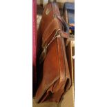A vintage brown leather briefcase - worn