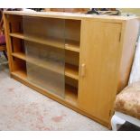 A 1.36m vintage book cabinet with shelves enclosed by sliding glass doors and cupboard to one