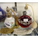 Four vintage scent bottles including Aynsley bone china, Stuart and other glass