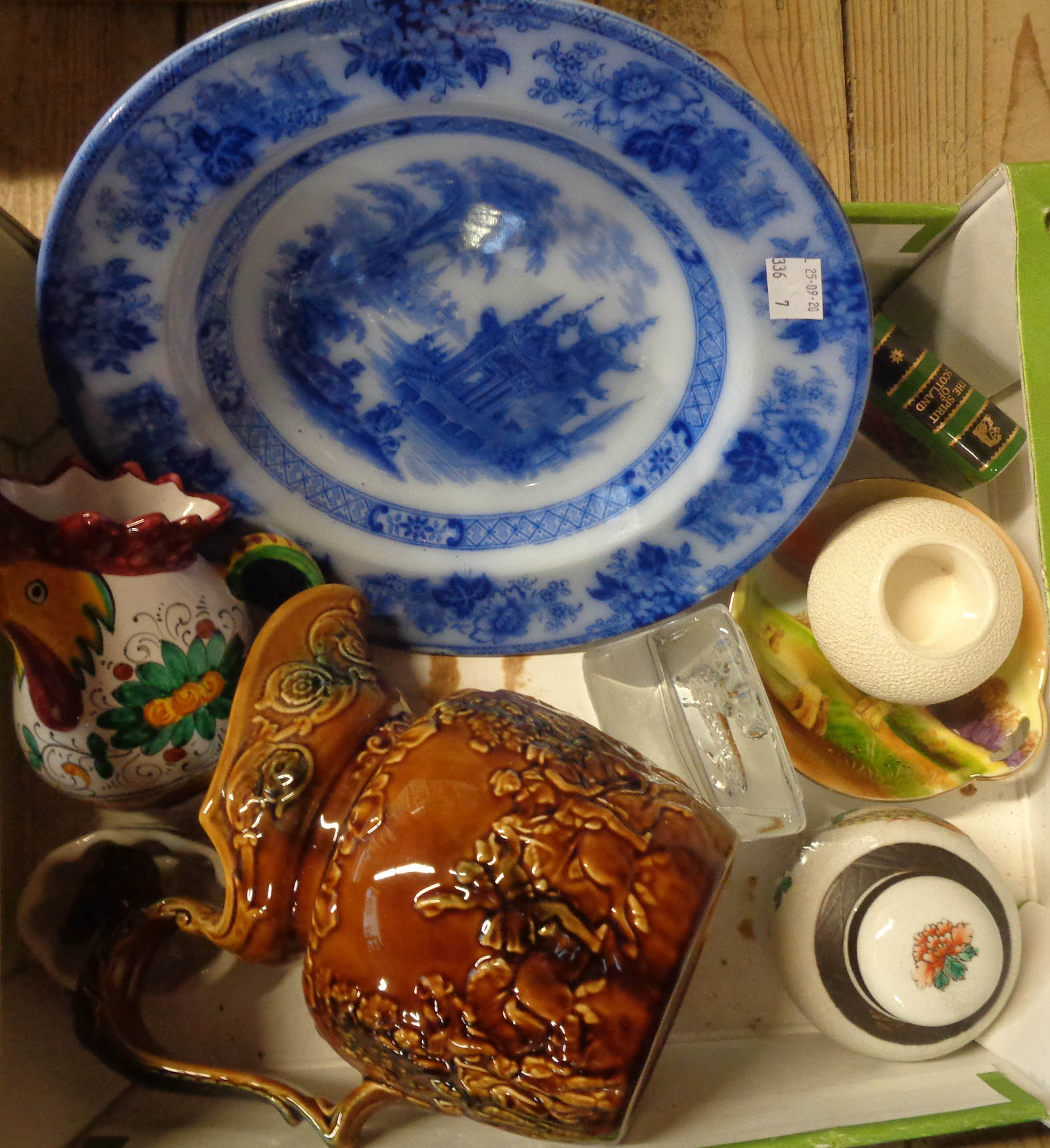 A box containing a collection of assorted ceramics including a small aspic mould, Carlton Ware match
