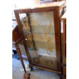 A 58cm mid 20th Century polished walnut display cabinet with glass shelves enclosed by a decorated