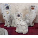 Three associated Staffordshire dogs