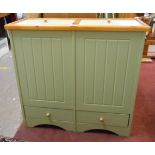 A 73cm modern pale green finish refuse unit with two lidded compartments to top and two drawers