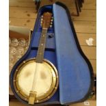 A vintage cased Bell-Tone banjolin - for restoration
