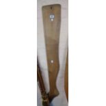 A vintage treen stocking display leg