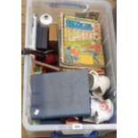 A box containing assorted items including books, jugs, Ray of the Rovers comics, etc.
