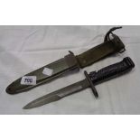 A mid 20th Century US M6 knife bayonet in US M8A1 scabbard