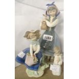 Two Lladro figures of girls holding baskets - sold with a Nao figure of a kneeling angel