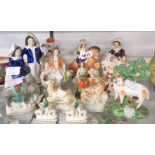 Fourteen Staffordshire figures including elephant, camel, etc. - various condition