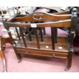 A reproduction mahogany Canterbury with slatted dividers and drawer under