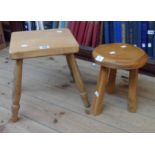 A rustic polished wood milking stool - sold with another with square top, set on turned legs