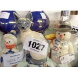A Royal Copenhagen Mini Collection Siamese cat - sold with two Royal Copenhagen snowmen