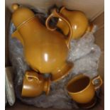 A 1960's brown pottery coffee set