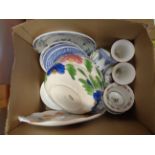A box containing assorted ceramics