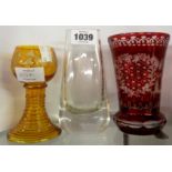 A German ruby flash cut glass beaker, an amber roemer, and a Swedish Karl Skoga engraved vase