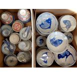 Two boxes containing a large quantity of modern Chinese table ware including bowls, rice bowls,